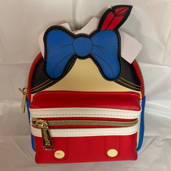 NWT Loungefly Disney Pinocchio Cosplay Wristlet (in original package) - Picture 2 of 9